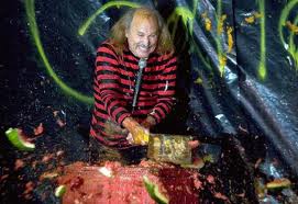 Gallagher smashing watermelon.jpg